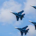 Military Aircraft Fly At Low Altitude Over The Audience During T